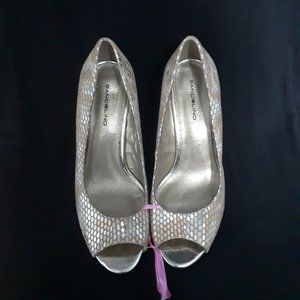 Vacation Ready Sandals    Bandolino gold wedge size 7